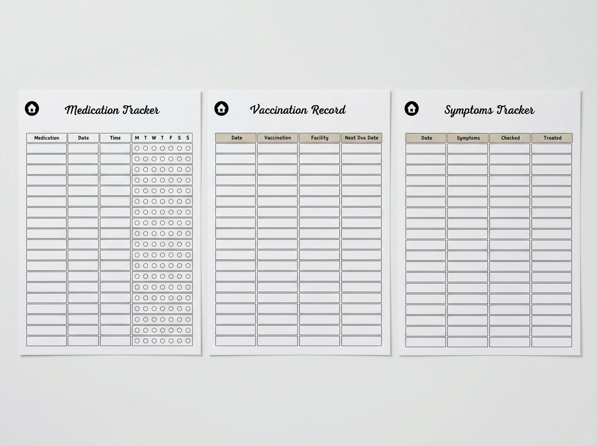 Medication Tracker, Vaccination Record and Symptoms Tracker pages laid flat side by side.